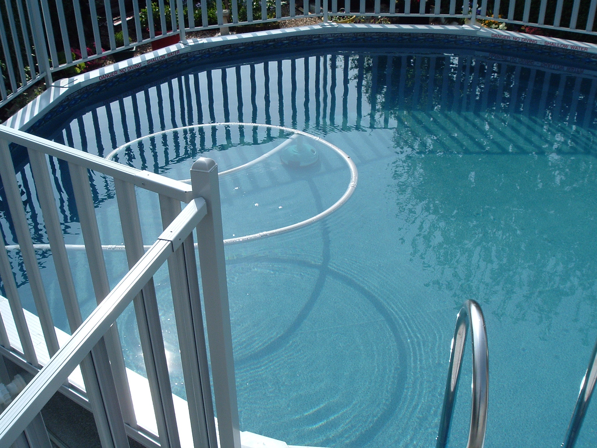 18ft diameter 'Classic'. View from deck showing Off-deck S/steel ladder and safety fence